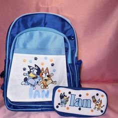 **PENCIL CASE is sell separately**  Delight your little one with this adorable Bluey-themed set, perfect for back-to-school!  Features: - Backpack:   - Spacious main compartment with a sturdy zipper   - Comfortable padded shoulder straps   - Durable and lightweight material   - Cute Bluey and Bingo design   - Personalized with your child's name   - Dimensions: 17.32x11.8x5.16 inches.   - Colors: Pink/Hot Pink, Dark Blue/ Yellow, Purple/Yellow, Blue/Light Blue *Personalization: - Add your child's Cute Blue Backpack For Back To School, Cute Blue Bag For Back To School, Cute Blue Bags For Back To School, Cute Blue Standard Backpack, Cute Blue School Bag, Themed Rectangular School Backpack, Blue Themed School Bags, Themed Blue School Bags, Themed Blue Backpack For End Of School Year