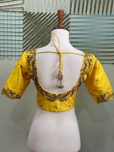 ❥ Handmade Designer stitched blouse ; Can be used for sarees / Lehengas. ❥ Ready to ship (Price mentioned is for Size 34-38)  ❀❀ Return / Exchange Policy :  ※ No Return/ No Exchange / No Cancellation! ※We need proof of video while package is opening for considering any case of missing or damaged products ;  ※ We can not accept any returns , if video at the time of package opening is not provided by the client . ღ ღ Please be courteous and don't ask for negotiation on prices ! We define prices ba Transitional Yellow Self-design Blouse Piece, Semi-stitched Yellow Chinon Blouse Piece, Yellow Unstitched Blouse With Cutdana Details, Yellow Unstitched Raw Silk Blouse Piece, Unstitched Yellow Long Sleeve Blouse, Maggam Work Blouses, Blouse Designs Indian, Indian Blouse, Work Blouse