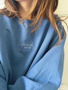 Our 'Childlike Faith' embroidered unisex heavy-blend sweatshirt is made with air-jet spun yarn for a soft and comfy fit. heavy-blend Unisex fit. We are a small business and all our items are made as ordered, so items can take around 3-8 business days to ship out our embroidered sweatshirts - but we will try our best to make sure our packages get to their new homes as soon as possible! Thank you for understanding. ♢ TEES available: https://www.etsy.com/listing/881320120/childlike-faith-confetti-s Childlike Faith, Christian Clothing Brand, Aesthetic Sweatshirt, Sweatshirt Aesthetic, Faith Clothing, Christian Sweatshirt, Christian Apparel, Comfy Fashion, Embroidered Sweatshirts