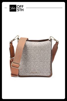 This Trendy Crossbody Back Shows Off A Handy Inside Pocket And Quintessential Logo Print, Perfect To Carry On The Go. Magnetic Closure Goldtone Hardware One Inside Zip Pocket Lining: Textile Trim: Textile Synthetic Imported Size Adjustable, Removable Crossbody Strap, 15"-24.5" Drop 7.75"w X 8"h X 3.25"d Please Note: Dust Bag Not Included. Center Core - Handbagsundefined Crossbody Strap, Magnetic Closure, Logo Print, Bag Sale, Inside Pocket, The Go, Carry On, Shoulder Bags, Zip Pockets