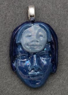 Woman in Blue Pendant is made with white clay and finished off with a shiny glaze.  Each piece is done by hand and then fired in a kiln.   Each piece has its own character and is different from the next.   This piece represents all women adorned of all cultures.   If you want an original and unique piece; this is the piece. Each one comes with a silver chain. Unique Hand Cast Blue Jewelry, Handmade Blue Clay Jewelry, Blue Artistic Pendant Necklace, Boot Bracelet, Boot Bling, Blue Pendant, White Clay, Hippie Boho, Silver Chain