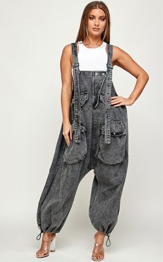 This oversized Bohemian Charcoal jumpsuit is designed with cargo style and numerous pockets for a functional yet stylish look. The pull cord hemline allows for easy adjustments and the machine washable fabric ensures easy maintenance. Perfect for sizes small to 2x. DENIM FABRIC available Instore and online All sales are final No exchange no refunds Jean Jumpsuit, Oversized Jumpsuit, Cargo Jumpsuit, Fitted Tops, Boxy Crop Top, Denim Jumper, Wrap Jumpsuit, Flare Jumpsuit, Edgy Chic