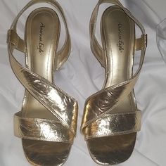 American Eagle 9.5 Gold 4 Inch High Heels Has A Strap Across The Shoe Name Of The Shoe Is Heidi Never Worn Summer Gold Heels With 4-inch Heel, Cheap Gold Heels With 4-inch Heel, Gold High Heel Court Shoes With 4-inch Heel, Gold Ankle-high Heels With 4-inch Heel, Gold High Heels With Gold-tone Hardware, Payless Shoes, Gold Strappy Heels, Shoes Names, Strappy Heels