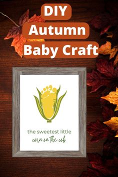 an autumn baby craft with leaves around it