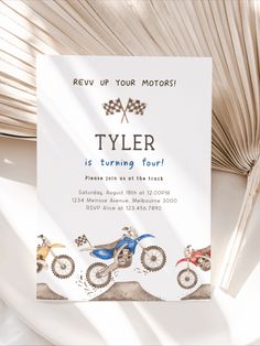 a motorcycle themed birthday party is shown with the name and age on it's card