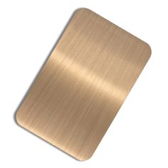 an image of a metal plate that is shiny and polished gold or silver color on white background