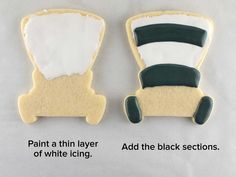 two decorated cookies with black and white icing on top of each other, one in the shape of a stroller