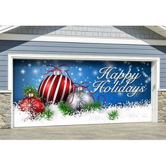 an open garage door decorated with christmas decorations