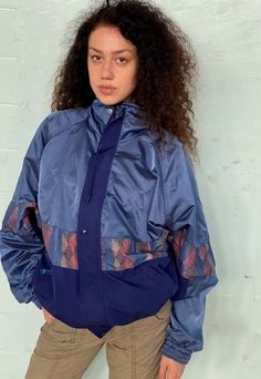 Vintage 80s Windbreaker Abstract print bomber jacket. Buttons up on collar, gathered bottoms, pockets, great condition. Size fits M. Length - 66 cm, bust - 140 cm. Browse our full collection for other matching items. Retro Blue Outerwear With Graphic Print, Vintage Patchwork Windbreaker For Fall, 90s Style Nylon Track Jacket For Fall, 90s Nylon Track Jacket For Fall, Vintage Blue Nylon Track Jacket, Retro Nylon Windbreaker For Fall, Retro Blue Windbreaker For Fall, Blue Retro Windbreaker For Fall, 90s Style Blue Track Jacket For Fall