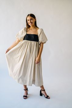 Get ready to slay in the Ambreen Puff Sleeve Maxi Dress! This unique dress features trendy puff sleeves and a flattering maxi length. The beige color adds a touch of sophistication, making it perfect for any special occasion. Stand out in style with this playful and chic dress! Details self: 100% cotton lining: 100% polyester Fabric Care Guide Here Sizing & Fit Measurements are approximate and taken while laying flat across the front. Not doubled. x-small: bust = 15"; length = 45" small: bust = Summer Cream Dress With Balloon Sleeves, Cream Balloon Sleeve Summer Dress, Summer Cream Balloon Sleeve Dress, Spring Maxi Dress With Elastic Puff Sleeves, Billowy Puff Sleeve Maxi Dress For Daywear, Chic Cream Midi Dress With Gathered Sleeves, Chic Cream Midi Dress With Puff Sleeves, Cream Puff Sleeve Dress With Gathered Sleeves For Brunch, Beige Billowy Puff Sleeve Dress