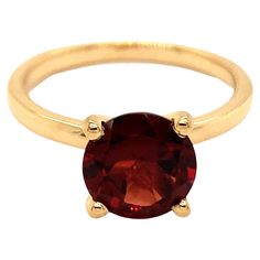 Round Shape Garnet Gemstone beautifully crafted in a Ring. A fiery Red Color January Birthstone. For a special occasion like Engagement or Proposal or may be as a gift for a special person. Primary Stone Size - 8x8mm