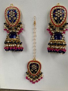 Stunning Heavy Indian Jhumka with Mangtika Set - A Statement of Tradition and Elegance Transform your look with our exquisite heavy Indian Jhumka with Mangtika set, designed for those who appreciate the beauty of traditional craftsmanship. This striking set is perfect for festivals, weddings, and grand celebrations, adding a regal touch to any outfit. Key Features: Intricate Heavy Jhumkas: Crafted with meticulous detail, these jhumkas feature bold designs and rich embellishments, creating a stun Indian Jhumka, Traditional Earrings, Special Events, Thoughtful Gifts, Jewelry Earrings Dangle, Embellishments, Dangle Earrings, Jewelry Earrings, Weddings