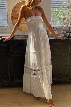 Indulge in timeless elegance with our Meridress Strapless Tube Hollow Out Lace Splice Tiered Maxi Dress. The strapless design and delicate lace splice add a touch of romance, while the tiered skirt enhances your silhouette. Perfect for any special occasion, this dress will make you feel confident and beautiful! Material:Cotton+Polyester SIZE US/CAN BUST WAIST HIPS S 2-4 33"-34" 26"-27" 36"-37" M 6-8 35"-36" 28"-29" 38"-39" L 10-12 37"-39" 30"-32" 40"-42" XL 12-14 40"-42" 33"-35" 43"-45" Sundress Outfit, Winter Mini Dresses, Floaty Dress, Summer Sundress, Long Beach Dress, Lace Splicing, Mini Robes, Maxi Styles, Tiered Maxi Dress