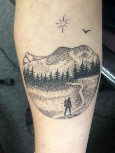 a person with a tattoo on their leg