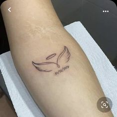 a person with a tattoo on their arm