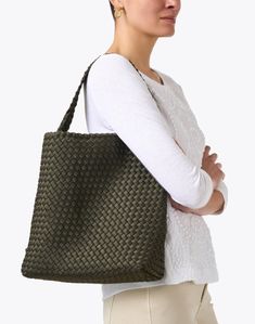 Designed with city girls in mind, Naghedi's new hobo handbag is chic and versatile, perfect for your on-the-go lifestyle. It's meticulously handwoven for a textured finish and features a coordinating interior zip pouch that's perfect for toting your everyday essentials. Wear with dresses or separates, this modern handbag will pair back to just about anything in your wardrobe. Versatile Hobo Bag With Braided Handles For On-the-go, Modern Hobo Bag With Braided Handles For Travel, Casual Textured Shoulder Bag For Everyday, Casual Everyday Textured Shoulder Bag, Woven Leather Hobo Tote Bag For On-the-go, Everyday Rectangular Shoulder Bag With Intrecciato Weave, Chic Textured Tote Bag, Rectangular Intrecciato Shoulder Bag For Everyday Use, Textured Rectangular Hobo Bag For Everyday