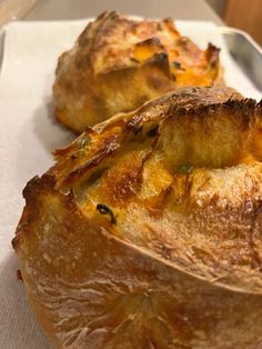 two pieces of bread sitting on top of a pan