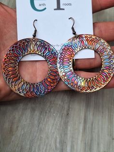 These boho style statement earrings are designed using copper hoops that have been fire painted with a propane torch to bring out the different colors in the metal. NOTE:  Certain types of lighting will bring out the colors more than other types of lighting. The earrings measure 2" diameter.  They will ship in a gift box via USPS with tracking info provided. Fire Painting, Types Of Lighting, Copper Earrings, Copper Jewelry, Jewelry Earrings Hoops, Statement Earrings, Beautiful Necklaces, Different Colors, Gift Box