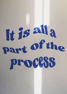 it is all a part of the process written in blue ink on a white surface