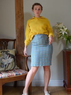 A beautiful vintage hand knitted yellow jumper, with a polo neck and short sleeves. Made from mid-weight wool.  Two buttons to the front. Cropped length. There's one small white mark to the front of the jumper (please see the last photograph). Otherwise the jumper is in very good condition with no bobbling or holes. Chest: 42"/ 106cm Waist: 36"/ 90cm Length: 21"/ 53cm Follow me on instagram for new stock previews and shop updates! https://www.instagram.com/elephantlondon/ Retro Fitted Sweater For Work, Vintage Wool Sweater For Workwear, Fitted Vintage Sweater For Work, Yellow Jumper, Cropped Polo, Wool Jumper, Polo Neck, Pullover Sweater Women, White Mark