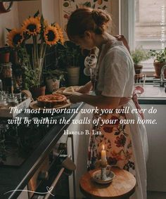 a woman standing in front of a counter with a pizza on it and a quote about the most important work you will ever do