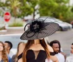 Beautiful black/cream 500mm brim hat couture classical hat for elegant ladies. Wear it at the weddings, or church or Ascot or Derby or club events- you will be definitely make a statement! Featured in Avant Garde magazine 2017. This hat is made of sinamay and covered with very unique mesh material. adorned with large feather flower and quills. Sinamay loops add an extra touch. It can be made in a wide range of colors and sizes. but the cover material will remain black.Please email me about the o Formal Hat, Royal Ascot Hats, Sinamay Hats, Couture Hats, Ascot Hats, Kentucky Derby Hats, Kentucky Derby Hat, Derby Hat, Celebrity Tattoos