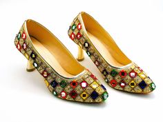 We are offering you our most stylish collection of footwear. These gorgeous shoes have an embroidered mirror and thread motif. The front has pointed toes, while the back has a short heel. These heels have a distinct design and vivid color clarity. wearable, long-lasting comfort. Due to its multicolored design and thread embroidery on gold with mirror work, it looks wonderful with any clothing. It is a stunning piece of craftsmanship. You can wear these exquisitely charming shoes to weddings, events, or even simply a relaxing night with friends. The heel measures 2.5 inches long. On our page, you can find more of our collection! We expeditiously send out packages that have been expertly wrapped for a secure journey. Thank you for supporting our small business! Shipped from USA. Sizes availa Multicolor High Heel Wedding Shoes, Multicolor High Heels For Wedding, Multicolor Embellished Heels For Formal Occasions, Elegant Multicolor Wedding Heels, Traditional High Heel Festive Heels, Traditional Pointed Toe Party Heels, Traditional Pointed Toe Heels For Party, Festive Gold Heels With Zari Work, Festive Gold Embellished Heels