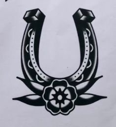 a drawing of a horseshoe with flowers on it