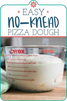 an easy no - knead pizza dough recipe in a glass bowl