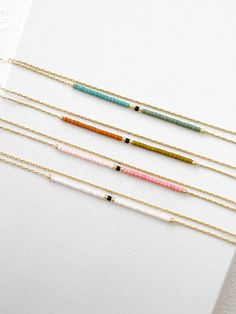 Gold Delicate Necklace With Tiny Beads, Layering Double Necklace, Minimalist Dainty Necklace, Soft Colors Minimal Boho Necklace - Etsy Minimalist Beaded Bracelets With Delicate Chain, Minimalist Beaded Necklace With Delicate Adjustable Chain, Minimalist Adjustable Beaded Necklace With Delicate Chain, Minimalist Beaded Necklaces With Adjustable Chain, Minimalist Beaded Chain Bracelet For Gift, Minimalist Colorful Beaded Jewelry For Gifts, Minimalist Beaded Necklace With Delicate Chain As Gift, Minimalist Beaded Bracelet With Adjustable Chain, Everyday Minimalist Beaded Necklace With Delicate Chain