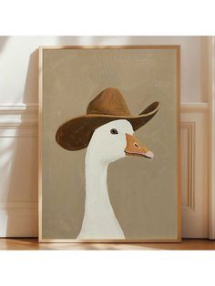 a white duck wearing a brown cowboy hat