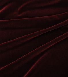 the fabric is very dark red in color