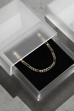 Designed to layer together, elevate any outfit with our Signature, Figaro and Cuban Chains ... Plated in 18k gold and protected with an anti-tarnish rhodium coating. Just in time for Christmas, shop now with extended returns x