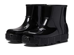 UGG Drizlita - Women's Boots : Black : The Drizlita is a waterproof statement boot made with recycled leftovers from UGG's iconic classic. Featuring a soft insole lined in UGG signature sheepskin, this cozy and colorful silhouette makes a statement in any level of downpour. Waterproof Designed to help protect against heavy weather conditions, including water, rain, and snow. If present, zippers and tongues are gusseted and treated with water-repellent coatings. Best for: Heavy rain. Waterproof (one piece injection uppers), synthetic, PVC upper. 7mm sheepskin insole. UGG logo woven label on sockliner. Midsole made with recycled EVA regrind. PVC outsole. This product contains real fur from sheep or lamb. Fur may be sourced from Australia, Ireland, the United Kingdom, or the United States. It Ugg Drizlita, Ugg Shoes Women, Water Rain, Air Shoes, Cute Couple Outfits, Nike Air Shoes, Heavy Rain, Black Boots Women, Woven Label