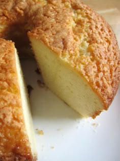 a close up of a cake on a plate with one slice cut out and ready to be eaten