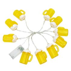 yellow plastic beer mugs with white handles and string lights are shown on a white background