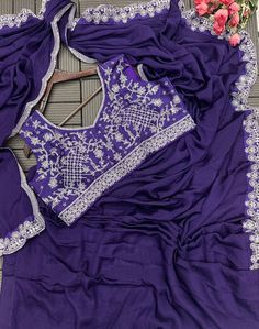 *New Super Trending Embroidery cording work ready to wear saree with Embroidery Blouse*

*💃SAREE DETAILS*

*Fabric* :  Heavy Chinon 
*WORK*. : Embroidery cording work
*Stiching type*    : Ready to wear

*💃 BLOUSE*
*Fabric*- Banglori
*Work*- Embroidery cording work ( full Stiched)
*Size*- Full Stiched upto 42

*Weight* :- 800 gram

*Rate:- 1799/-free shipping*

*👍🏻 SUPREME QUALITY AS ALWAYS*

~Studio Trendy Saree, Purple Embroidery