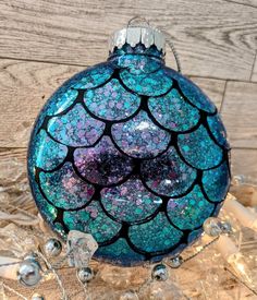 a blue ornament sitting on top of a table