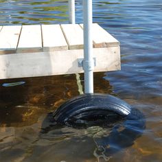 an object is in the water near a dock