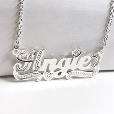 "Personalized Single Name Plate Necklace In Sterling Silver Made Of Pure Solid 925 Sterling Silver. Order this single Plate Name Necklace With YOUR NAME with Heart Tail in Sterling Silver Size :1.5-2\" Inches Wide/40-50mm 0.5\"-0.55\"Inch High/16mm-18mm How to Order Please write the your Name in Personalization and choose chain length. Important!! Choose Only Your Name Up to 10 letters First letter will be Script Capital Letter(If you do not note) If you do not mention about chain length , we of Custom Name Necklace Silver, Silver Name Plate Necklace, Mha Dr, Name Plate Necklace, Silver Name Necklace, Personalized Name Plates, Name Necklace Silver, Sterling Silver Name Necklace, Necklace Name