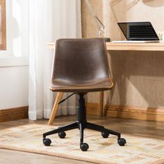 a brown leather office chair sitting on top of a rug