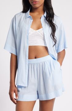 Crisp PJs with a collared short-sleeve shirt and elastic-waist shorts are ones you'll want to wear all weekend long. 26 1/2" length top; 2 1/2" inseam; 31" leg opening; 12 1/2" front rise; 16" back rise (size Medium) Top has front button closure; notched collar; short sleeves; chest patch pocket Shorts have elastic waist 55% cotton, 45% viscose Machine wash, tumble dry Imported Relaxed Fit Beach Tops, Short Length, Vacation Tops With Relaxed Fit And Short Length, Relaxed Fit Vacation Top, Short Length, Relaxed Fit Short Length Vacation Tops, Blue Collared Relaxed Fit Sleepwear, Summer Short Set With Short Sleeves For Loungewear, Blue Short Sleeve Sleepwear For Summer, Relaxed Short Length Tops For Vacation, Relaxed Fit Short Tops For Beach