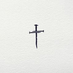 a cross is shown in the middle of a watercolor painting with black ink on white paper