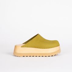 The Clog just got a lot more fun!!! The Chonk is built on a sturdy solid-wood base, with a layer of shock-absorbing rubber at the bottom. The Chonk fits medium to wide, and the base height is 2 1/4". They are so fun and comfortable. Our fennel nubuck is a gorgous yellow/green color, which is the perfect pop to go with Clog Fits, 2023 Aesthetic, High Heel Clogs, Walk A Mile, High Sandals, Expensive Taste, Clogs Style, Bare Necessities, Sock Shop