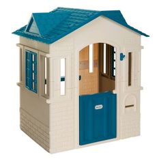 a toy house with a blue door and windows