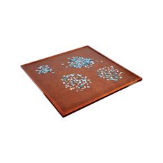 a wooden tray with blue and white beads on it, sitting on a white surface