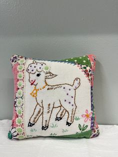 a decorative pillow with a dog on it