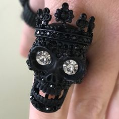 New Crystal Rhinestone Pave Crown Skull Stretch Ring. Black Color. Size: 1.5” H. Stretchable. Thanks For Viewing! Edgy Black Metal Skull Ring, Edgy Black Skull Ring For Halloween, Gothic Black Skull Ring For Halloween, Black Metal Skull Ring As Gift, Black Metal Skull Ring Gift, Black Metal Skull Ring For Gift, Black Metal Skull Ring, Black Skull Ring For Halloween, Gothic Black Rings With Skull Print