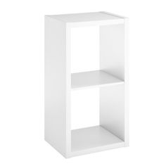 a white shelf with three shelves on each side and an open door at the top