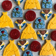 beauty and the beast decorated cookies on a table